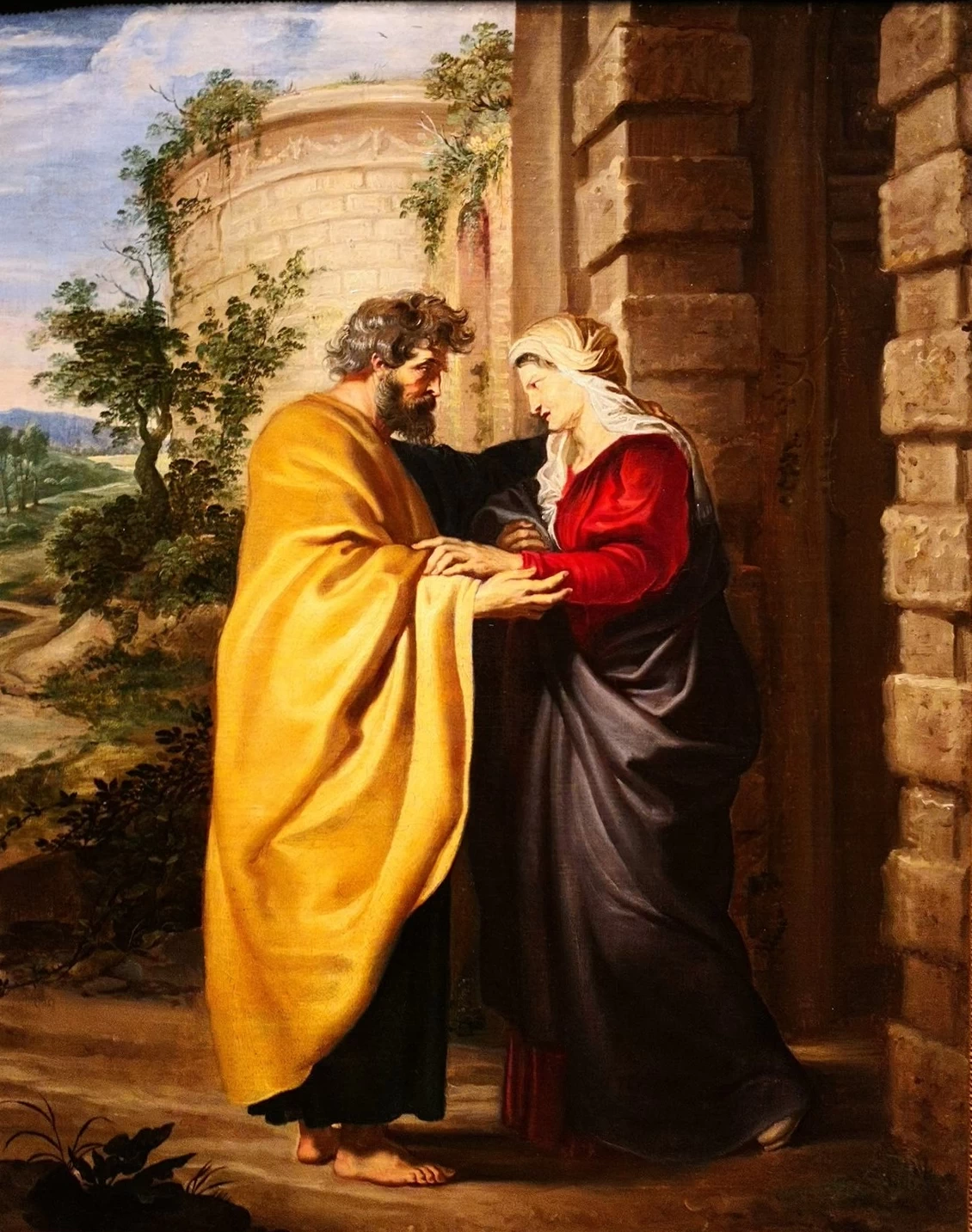 Abbraccio davanti alla porta dorata